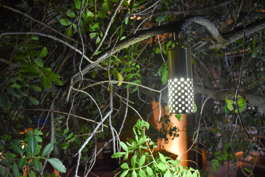 Brilliance Bryce perforated hanging downlight illuminated at night