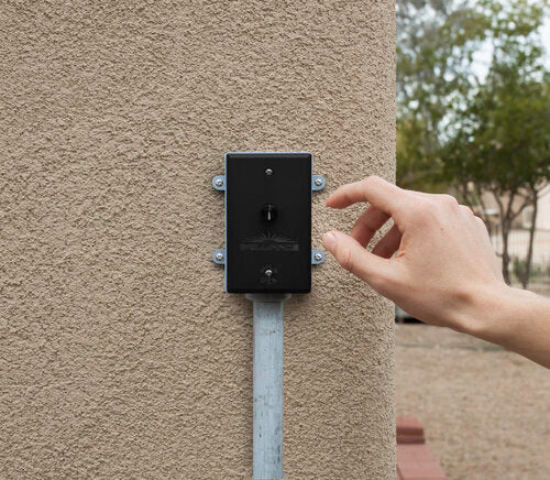 Brilliance 12VAC LED dimmer installed alongside landscape lighting equipment