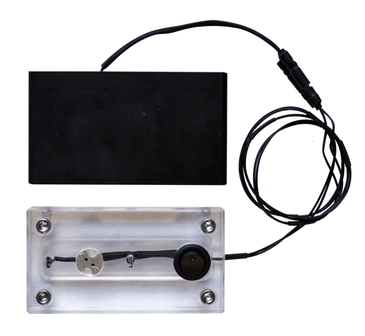 Brilliance Chameleon programming puck with battery compartment detail