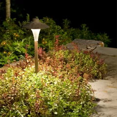 CAST CCH1CB Small China Hat bronze path light illuminating a landscape at night