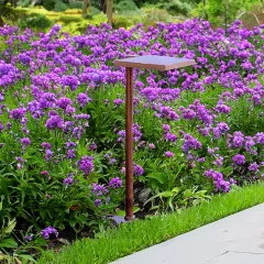 CAST CPL1CB Classic Prairie path light installed among landscape flowers